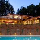Two Floor Building Inviting Two Floor Aptos Retreat Building Seen By Night With Dim Light Illuminating The Living Space And Landscape Dream Homes Elegant Modern Family Retreat With Cozy Red Kitchen Colors