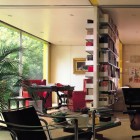 Home Library Two Catchy Home Library Design With Two Sides Shelves In White Full Of Books In Glass Room Windows With Red Leather Sofas Interior Design Nice Home Library With Stunning Black And White Color Schemes