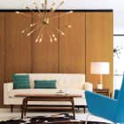 Gold Chandelier Wood Glaring Gold Chandelier Above Lacquered Wood Coffee Table Comfortable Contemporary Sofa Soft Leather Carpet On Ceramic Floor Decoration Elegant Contemporary Sofa With Comfortable And Casual Sitting Rooms
